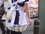 English: A woman in a Maid Cosplay uniform advertising a shop. Provided here for if someone wants an image that doesn't show a face, to avoid personal privacy rights. Enjoy! (Don't forget to attribute!)