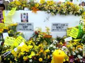 English: Former Philippine President Corazon Aquino's grave is next to her husband Ninoy Aquino's at the Manila Memorial Park in Sucat, Paranaque, Philippines