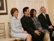Mrs. Laura Bush attends the Afghan Children's Initiative Benefit Dinner at the Afghanistan Embassy in Washington, DC on Thursday evening, March 16, 2006. Seated with Mrs. Bush are Dr. Khaled Hosseini, author of The Kite Runner; Mrs. Shamim Jawad, host and