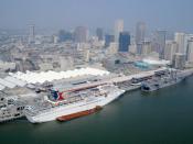 English: New Orleans, September 20, 2005 - A Carnival Cruise Line ship contracted by FEMA is berthed behind the U.S.S Iwo Jima on the city's waterfront. Housing for workers and evacuees alike is in short supply since Hurricane Katrina struck the area.