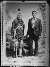 Full length portrait of Indian and white man - NARA - 523715