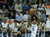 Geary Claxton makes a slam dunk for Penn State against Colgate.