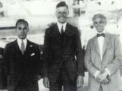 Edsel Ford, Charles Lindbergh, and Henry Ford pose in the Ford hangar during Lindbergh's August 1927 visit.