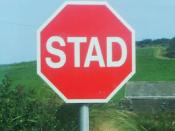 English: Irish language stop sign with text 