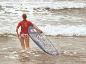 Surfer Woman is Surfing in Bikini