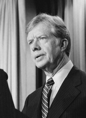 President Jimmy Carter announces new sanctions against Iran in retaliation for taking U.S. hostages