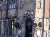 The Fighting Cocks - pub in Moseley - coat of arms above door