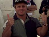 Owen Hart takes a moment out of his autographing session to pose for the cameras. WWF wrestlers were guest of the Coast Guard at the annual airshow held on Andrews AFB.