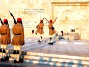 English: Evzones at the Tomb of the Unknown Soldier, Hellenic Parliament, Athens, Greece. The sculpture is of a Greek soldier and the inscriptions are excerpts from the Funeral Oration of Pericles, 430 B.C. in honour of Athenians slain in the Peloponnesia