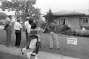 Group of African Americans viewing the bomb-damaged home of Arthur Shores, NAACP attorney, Birmingham, Alabama