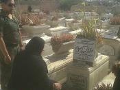 Khaled Mohamed Saeed's mother visiting his grave