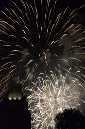 English: White fireworks go off over parliament hill,