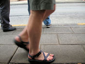 An example of walking in sandals.