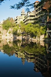 View of gazebo and guest rooms from the location where guests are encouraged to feed trouts with food pellets, at Mohonk Mountain House
