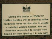 English: Please Conform The sign on the area ready for planting.