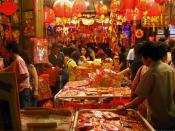 A scene in a street market in Chinatown, Singapore, during the Chinese New Year holidays.