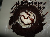 Flourless chocolate cake with vanilla ice cream