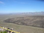 English: I took this picture atop Yucca Mountain in Nye County, Nevada on June 7, 2005. Looking west atop Yucca Mountain towards Beatty and Death Valley