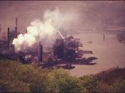 SMOKE EMITTED FROM A COKE PLANT OWNED BY THE UNITED STATES STEEL CORPORATION. IT IS LOCATED ALONG THE MONONGAHELA... - NARA - 557222