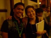 English: Mark Pere Madrona and UP School of Economics professor emeritus Winnie Monsod. Taken after her last lecture for 2nd semester, academic year 2010.