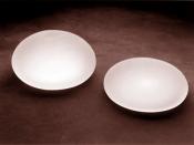 Breast implant: saline solution filled breast implant device models.