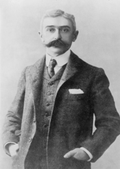 Baron Pierre de Coubertin, half-length portrait, standing, facing front