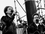 English: Singer-Songwriter duo Simon & Garfunkel performing outside at a concert in Dublin