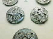 English: Early 9th century Anglo-Saxon silver brooches found at Pentney, Norfolk in 1977. On display at the British Museum, London.