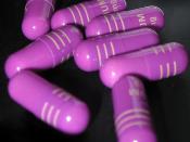 Eight Nexium (esomeprazole magnesium) pills, 40 mg, against a black background.