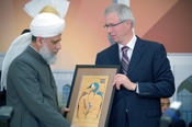 In Calgary His Holiness Mirza Masroor Ahmad (left) and Liberal Opposition Leader Stephane Dion at the opening inauguration of the Baitannur mosque, the largest in Canada.