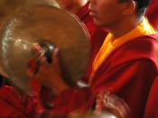 Tibetan Buddhist monks plays cymbals during music offering, vibrating everything, traditional red and yellow robes, Sakya Lamdre, Tharlam Monastery, Boudha, Kathmandu, Nepal