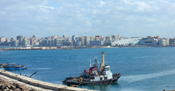 English: A view of Alexandria harbour in Egypt during February 2007. The new Alexandria library can be seen in the background.