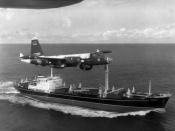 A U.S. Navy P-2 of VP-18 flying over a Soviet freighter during the Cuban Missile Crisis.