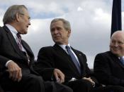 Secretary of Defense Donald Rumsfeld shares a laugh with President George W. Bush and Vice President Dick Cheney during his farewell parade at the Pentagon.