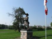 English: Statue of Jesse Lloyd in Lloydtown Ontario at the South-West corner of Rebellion Way and Little Rebellion Rd, depicting him in the Rebellion of 1837 gesturing to the South-East, presumably towards Toronto. There is a matching plaque on the South-