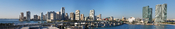 English: Panoramic view of downtown Miami, Florida from the Port of Miami. The bridge on the lower edge of the image carries Port Boulevard to Dodge Island in Biscayne Bay.