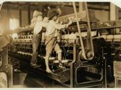 Textile mill workers. Spinning machinery. Macon, Georgia, 1909