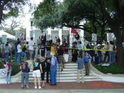 Protesters gather at the front gate of the Texas governor's mansion during the 6th Annual March to Stop Executions
