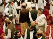 KANDAHAR, Afghanistan (June 13, 2010) — Tribal and religious leaders gather following a shura held by Afghan President Hamid Karzai in Kandahar. The meeting highlighted the need for support of NATO-led forces in order to stabilize parts of the province. (
