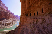 English: Ancestral Puebloan granaries high above the Colorado River at Nankoweap Creek, Grand Canyon.