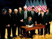 George W. Bush signing the Partial-Birth Abortion Ban Act of 2003, surrounded by members of Congress