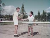 Grant Moore and Alex Groetaers shake hands on tennis courts at Waskesin, Prince Albert National Park, Saskatchewan / Grant Moore et Alex Groetaers se serrent la main sur le terrain de tennis à Waskesiu, au parc national de Prince Albert, en Saskatchewan