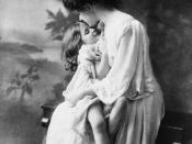 Mother holding girl.