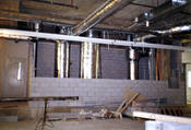 Dupont Canada building in Mississauga, Ontario, Canada, HVAC shaft wall construction made of concrete block, 2 hour fire-resistance rating. The ducts are made of sheet metal and insulated with fibreglass insulation.