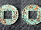 English: The front and reverse sides of a metal coin, 25.5 mm in diameter, issued during the reign of Emperor Wu (r. 141–87 BCE) of the early Han Dynasty of China.