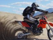 Dumont Dunes, California. Rider (author) is on 2004 KTM EX/C 525 dirt-bike outfitted with paddle tire. Dumont is 30 miles north of Baker on Highway 127 and features the highest dunes in California. It is also one of the few sand dune areas that exhibit an