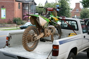 English: Dirt bike fixed to a truck bed on Franklin Street in Chapel Hill, North Carolina.