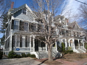 Robert Frost House, 29-35 Brewster Street, Cambridge, Massachusetts, USA. This building is listed on the National Register of Historic Places. According to a blue historical plaque on the building, it was home to noted poet Robert Frost (1874-1963) during