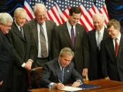 George W. Bush signing the Partial-Birth Abortion Ban Act of 2003, surrounded by members of Congress