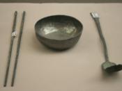 Chinese silver chopsticks, cup, and spoon from the Song Dynasty (960-1279 AD) of medieval China.